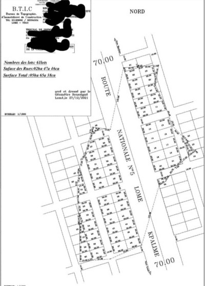 5 hectares ( 50 lots ) avec titre foncier au bord du goudron