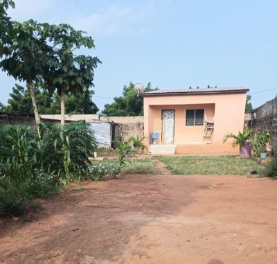 1 lot cloturé avec titre foncier à 800m du goudron