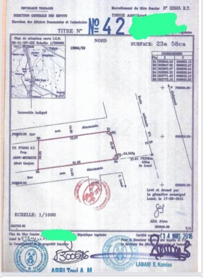 4 lots collés cloturés avec titre foncier au bord du goudron