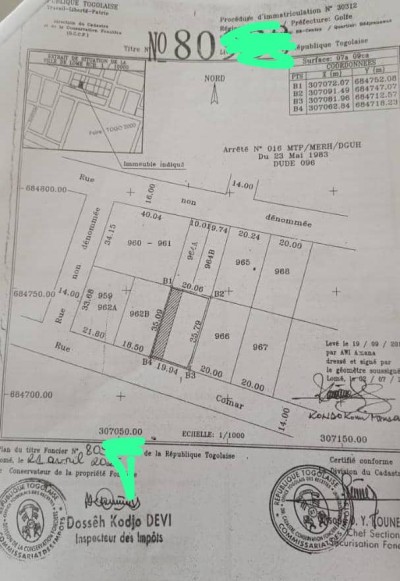 1 lot 1/4 cloturé avec titre foncier derrière la foire