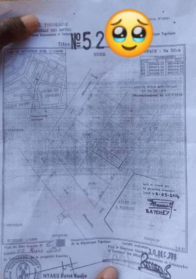 démi lot cloturé avec titre foncier  à 150m du goudron