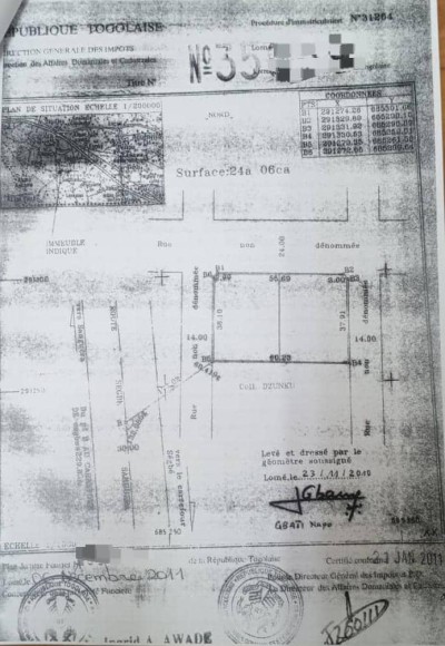 2 lots collés cloturés avec titre foncier à 200m du goudron