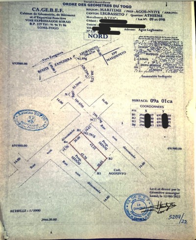 1 lot et démi cloturé avec titre foncier en cours
