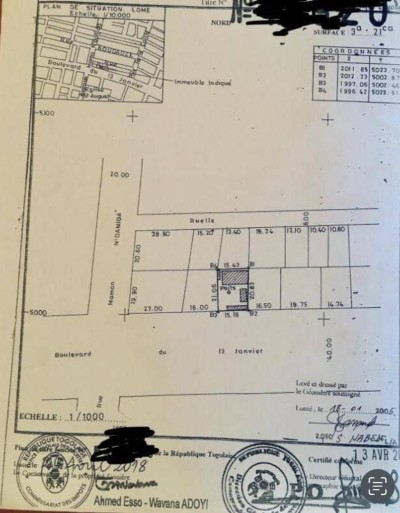 démi lot avec titre foncier au bord du boulevard du 13 janvier