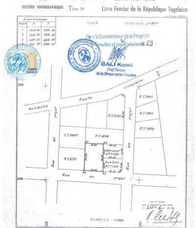 1 lot cloturé avec titre foncier a 200m du goudron +4 pièces