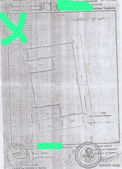12 lots collés cloturés avec titre foncier à 100m du goudron