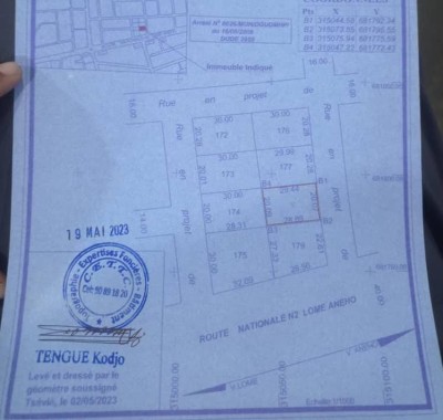 1 lot avec titre foncier en cours à 20m du goudron