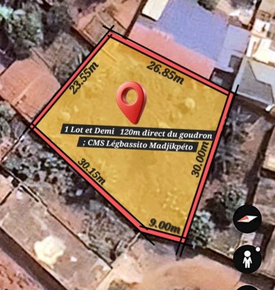 1 lot et démi cloturé avec titre foncier à 120m du goudron
