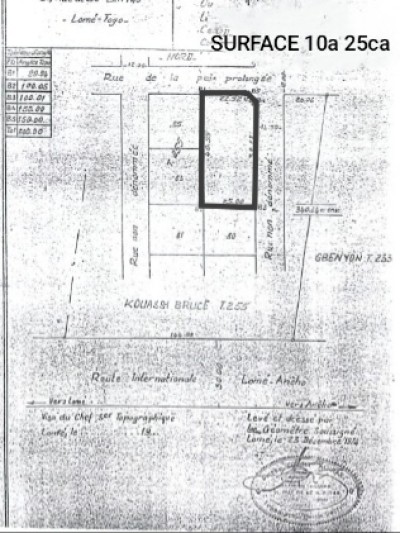 1 lot 3/4 avec titre foncier global  derrière ecobank