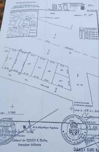 1 lot 1/4 avec titre foncier au bord du goudron