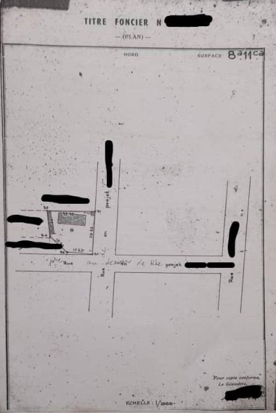 1 lot et démi avec titre foncier au bord des pavés
