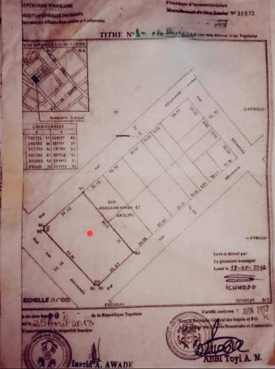 4 lots collés cloturés avec titre foncier global