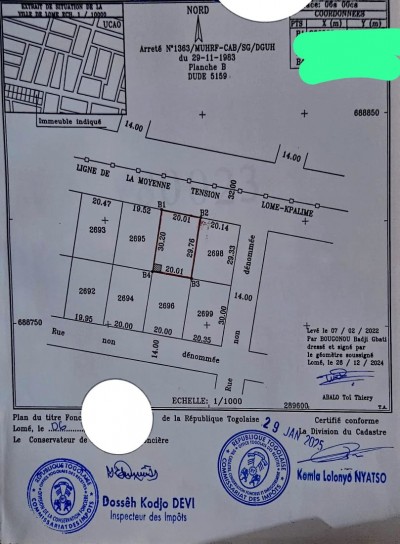 1 lot cloturé avec titre foncier à 1km du goudron
