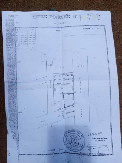 1 lot avec titre foncier au bord du goudron b. jean paul 2