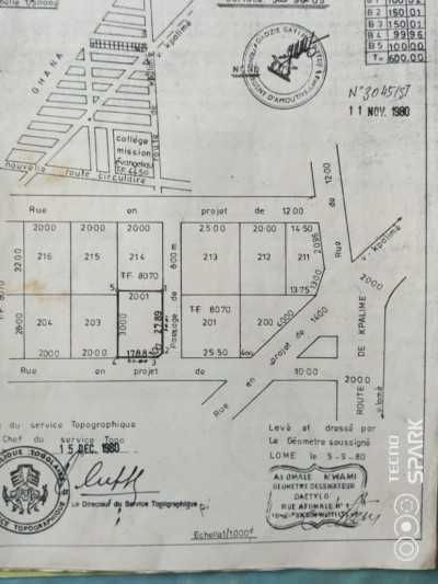 1 lot avec titre foncier au bord du goudron avec façade de 40m
