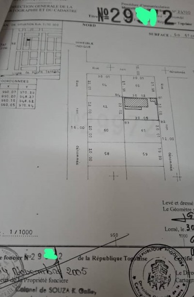 1 lot cloturé avec titre foncier bati de vieilles maisons