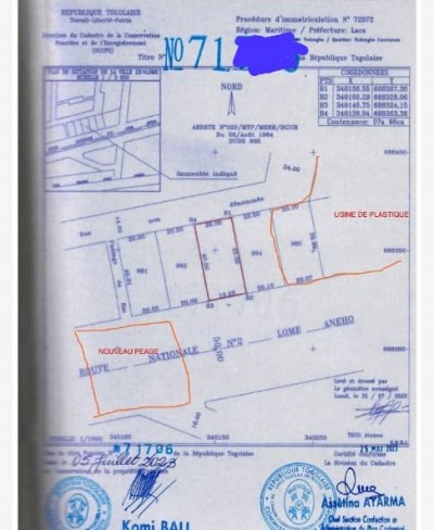 1 lot 1/4  avec titre foncier au bord du goudron