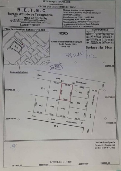 1 lot cloturé avec titre foncier en cours à 400m du goudron