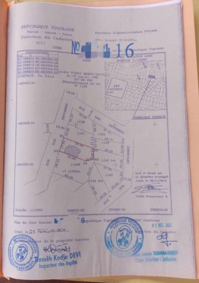 1 lot 1/4 cloturé avec titre foncier à 500m du goudron