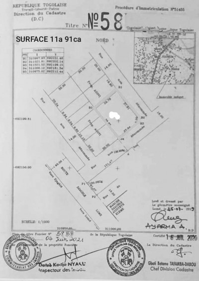 2 lots collés cloturés avec titre foncier à 200m du goudron