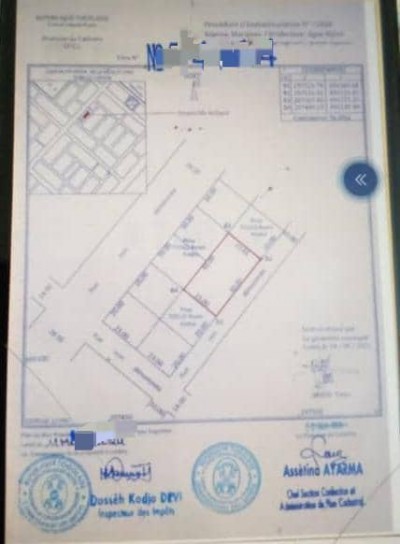 1 lot et démi cloturé avec titre foncier à 300m du goudron