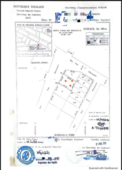 1 lot cloturé avec titre foncier derrière agence togocel