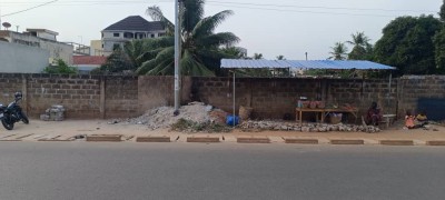 2 lots collés cloturés avec titre foncier au bord du goudron