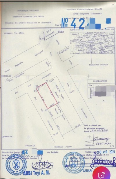 1 lot 3/4 avec titre foncier à 300ùm derrière la station t-oil