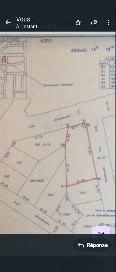 2 lots et démi  cloturés avec titre foncier à 100m du goudron