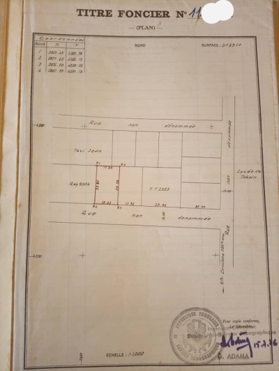 1 lot cloturé avec titre foncier tout proche station t-oil