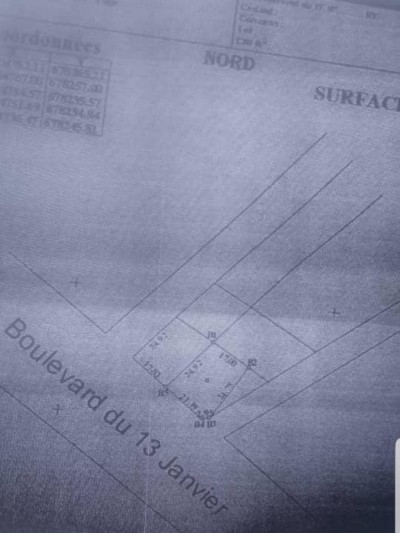 3/4 de lot avec titre foncier au bord du boulevard 13 janvier