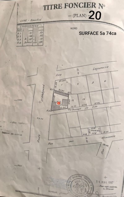 1 lot avec titre foncier au bord du goudron nationale 1