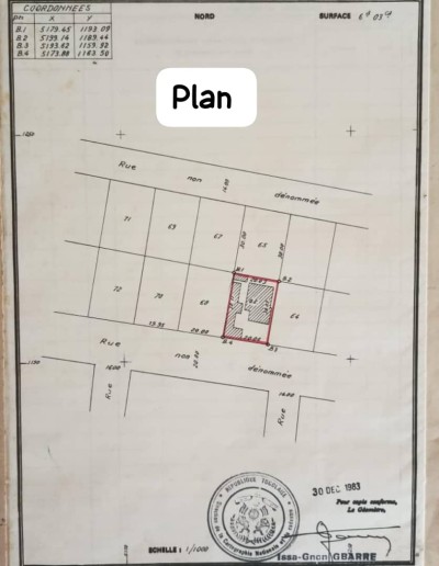 1 lot cloturé avec titre foncier derrière la station somayaf