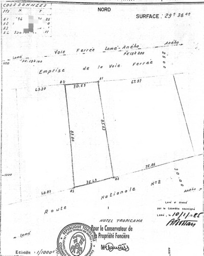 5 lots collés cloturés avec titre foncier au bord du goudron