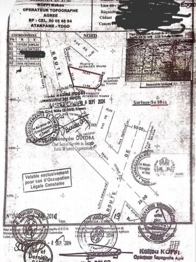 1 lot avec titre foncier en cours à coté de la mairie