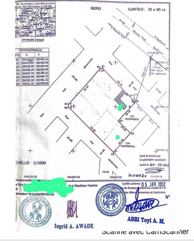 6 lots collés cloturés avec titre foncier global à 600m du goudron