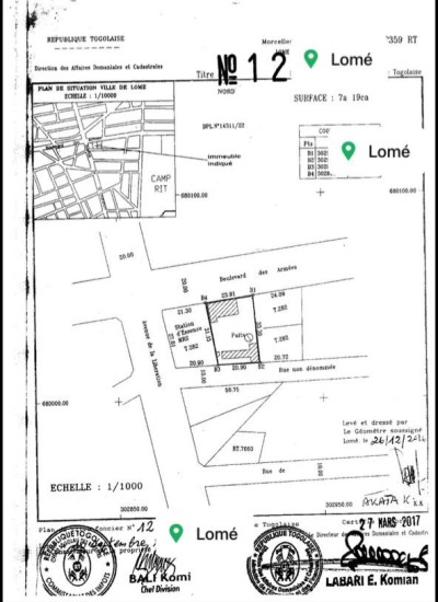 un immeuble bati sur 719m2 au bord du goudron avec titre foncier