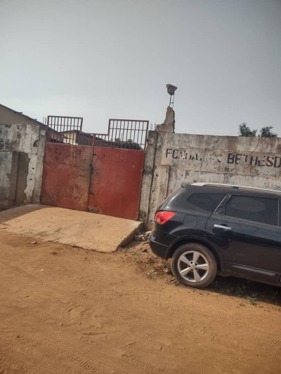 1 lot cloturé avec titre foncier global à 350m du goudron