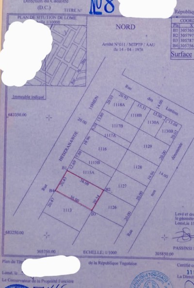 1 lot 1/4 cloturé avec titre foncier au centre ville