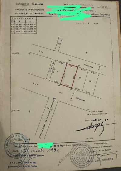 1 lot 1/4  cloturé avec titre foncier au bord du goudron