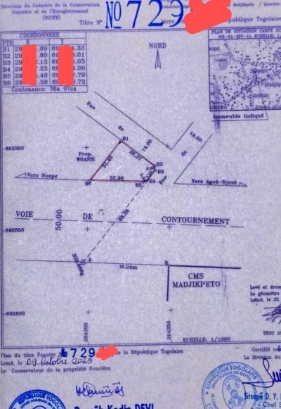 1 lot avec titre foncier au bord du goudron contournement