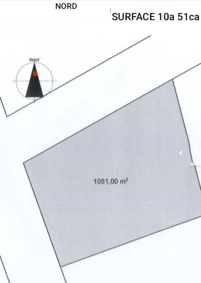 1 lot 3/4 cloturé avec titre foncier au bord du goudron
