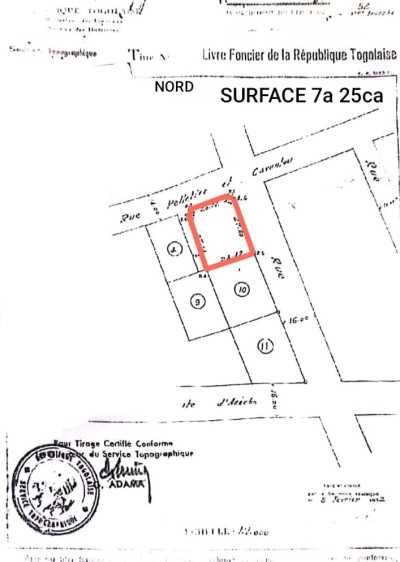 1 lot 1/4 cloturé avec titre foncier au grand marché assigamé