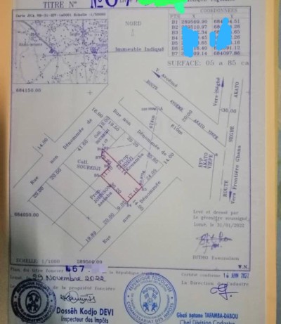 1 lot avec titre foncier derrière église catholique