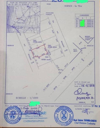1 lot cloturé avec titre foncier à 300m du goudron
