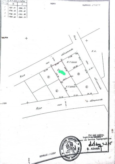 1 lot cloturé avec titre foncier à 300m du goudron