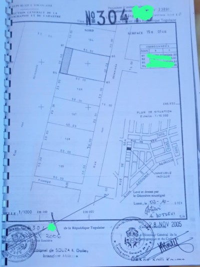 2 lots collés cloturés avec titre foncier au bord du goudron