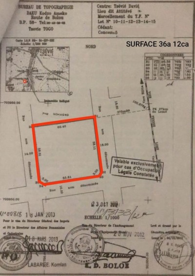 6 lots collés cloturés avec titre foncier à 700m du goudron
