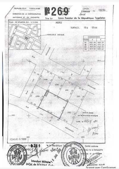 2 lots et démi cloturés avec titre foncier à 10m du goudron
