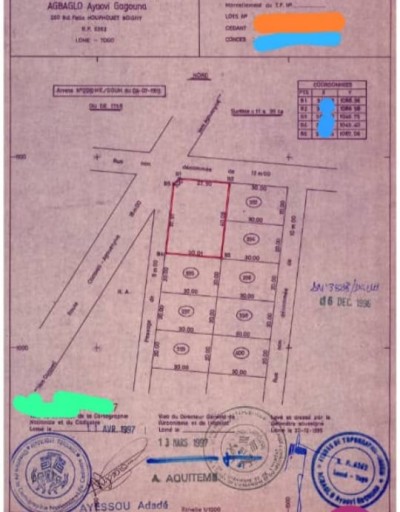 2 lots cloturés avec titre foncier à 200m du goudron